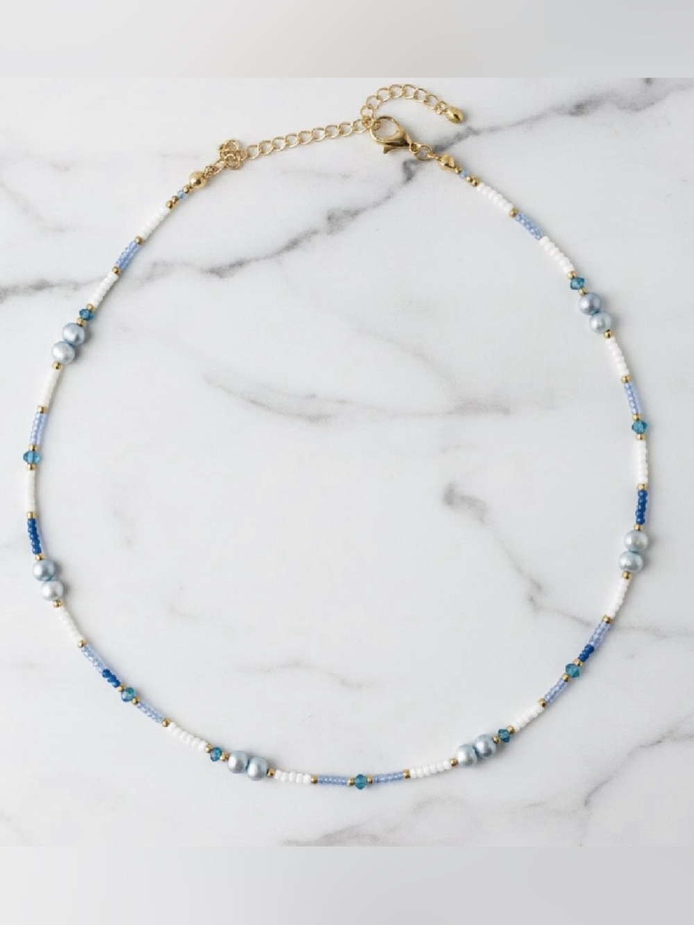Freshwater Pearl Necklace with blue and white seed beads and gold accent.